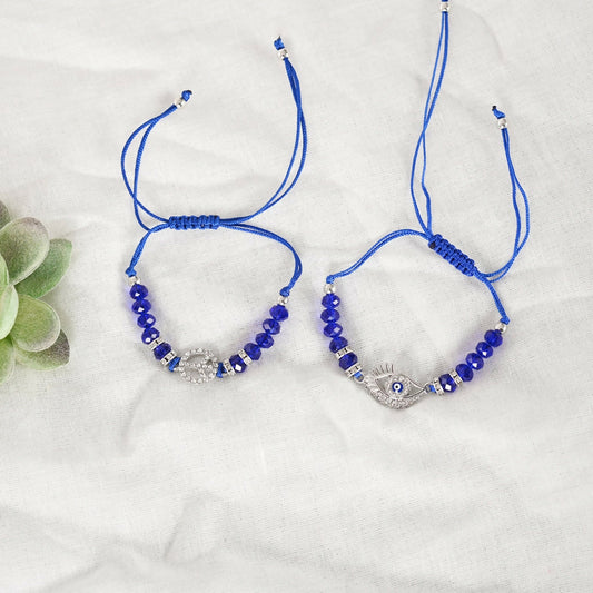 NVR Women & Men Set of 2 Blue Evil Eye Rakhi With Roli Chawal | Swadesiicart