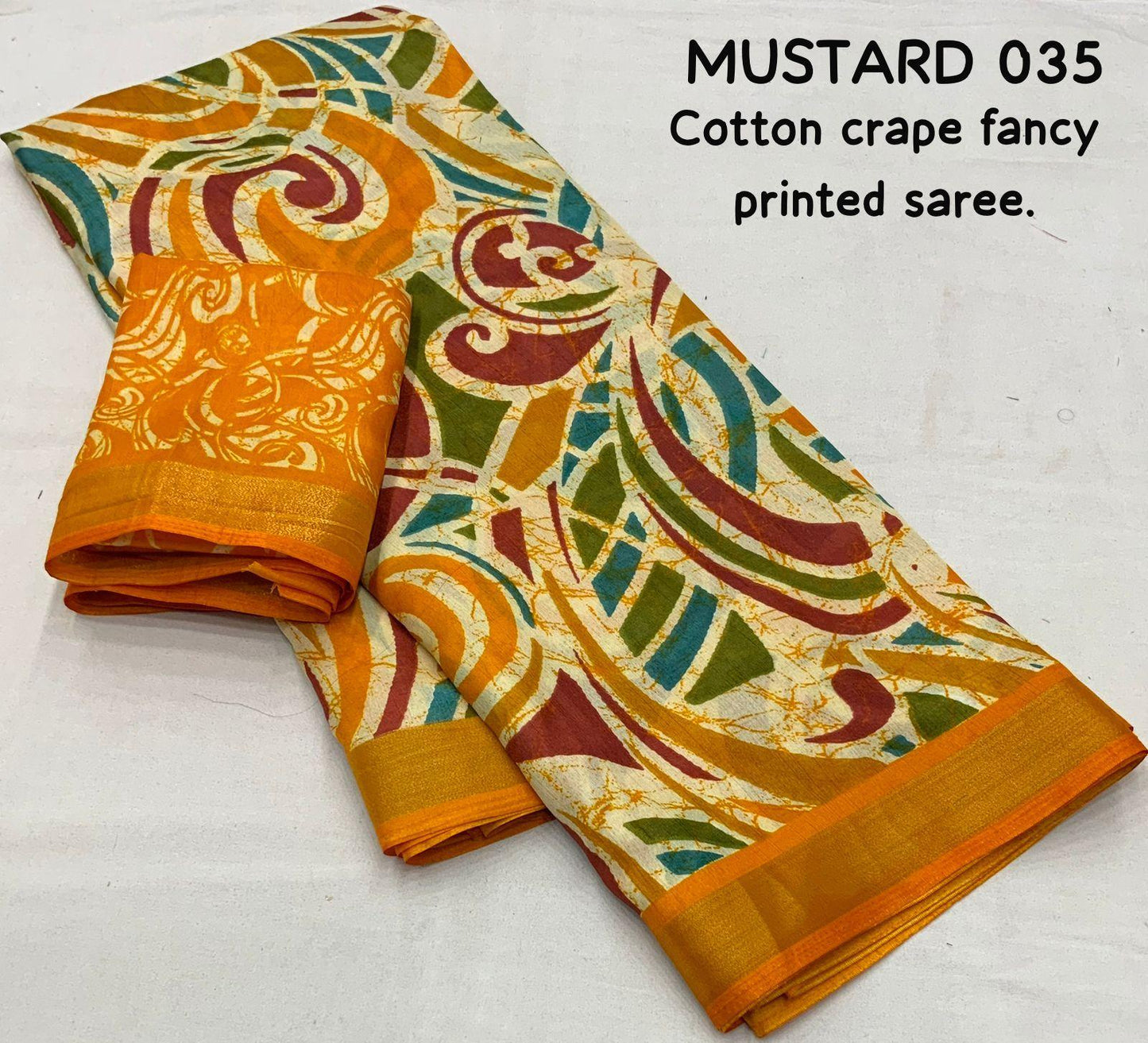 Mustard Cotton Crepe Batik Print Saree with Unstitched Blouse - Hiral Fashion | Swadesiicart