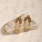 Gold-Polished Off White Contemporary Drop Earrings - Ruby Raang - Swadesiicart
