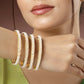 NVR Women's Set of 4 Gold-Polished Pearl Handcrafted Traditional Bangles - NR Retail-NVR