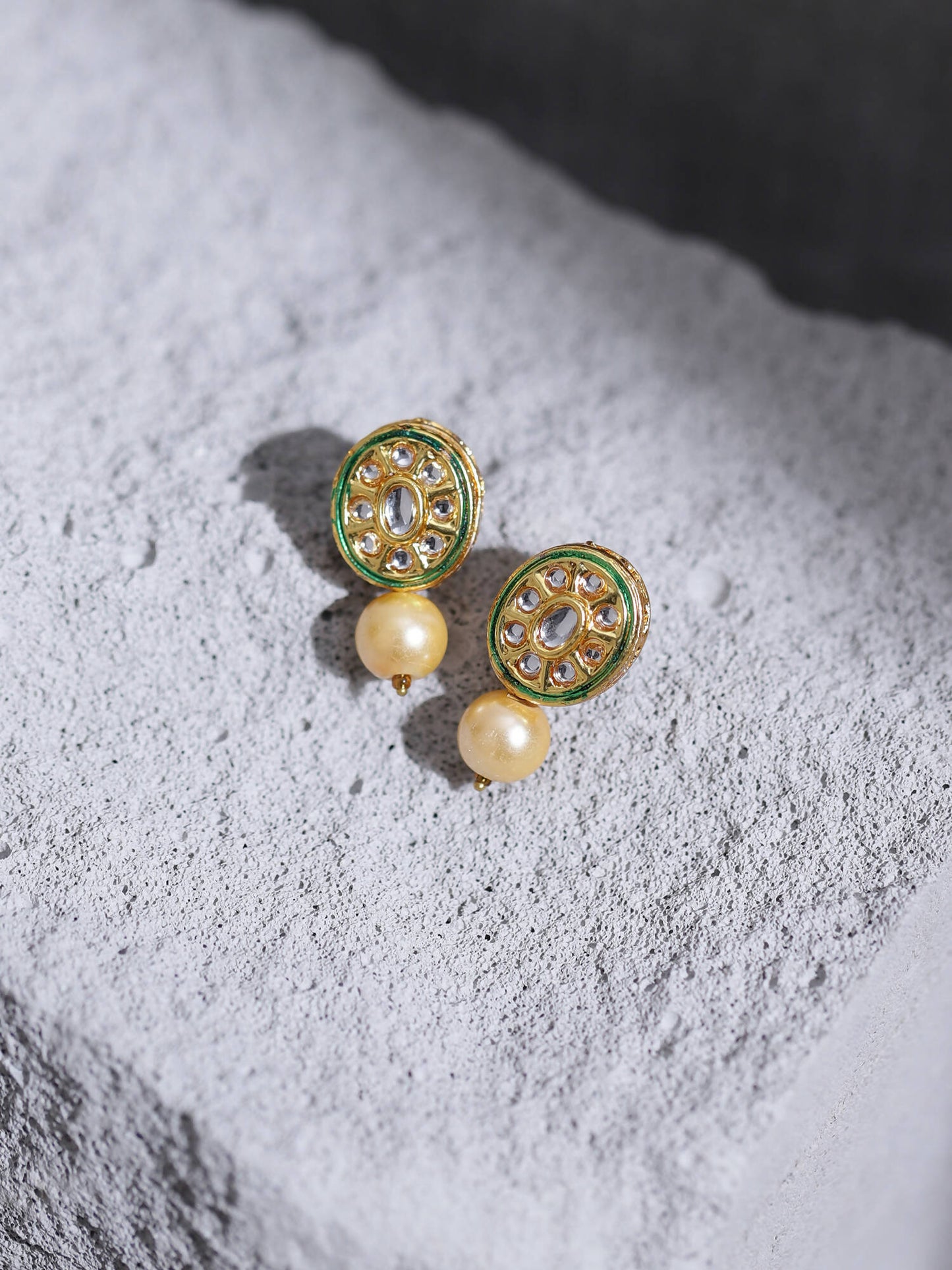 Gold-Toned White Kundan Oval-Shape Gold-Polished Studs Earrings - Ruby Raang | Swadesiicart