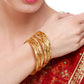 Gold-Polished Alloy Set Of 12 Thin Bangles - The Pari - The Pari - Dinesh Associates