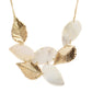 Gold-Polished Alloy Shell And Brass Leaf Statement Necklace - The Pari | Swadesiicart