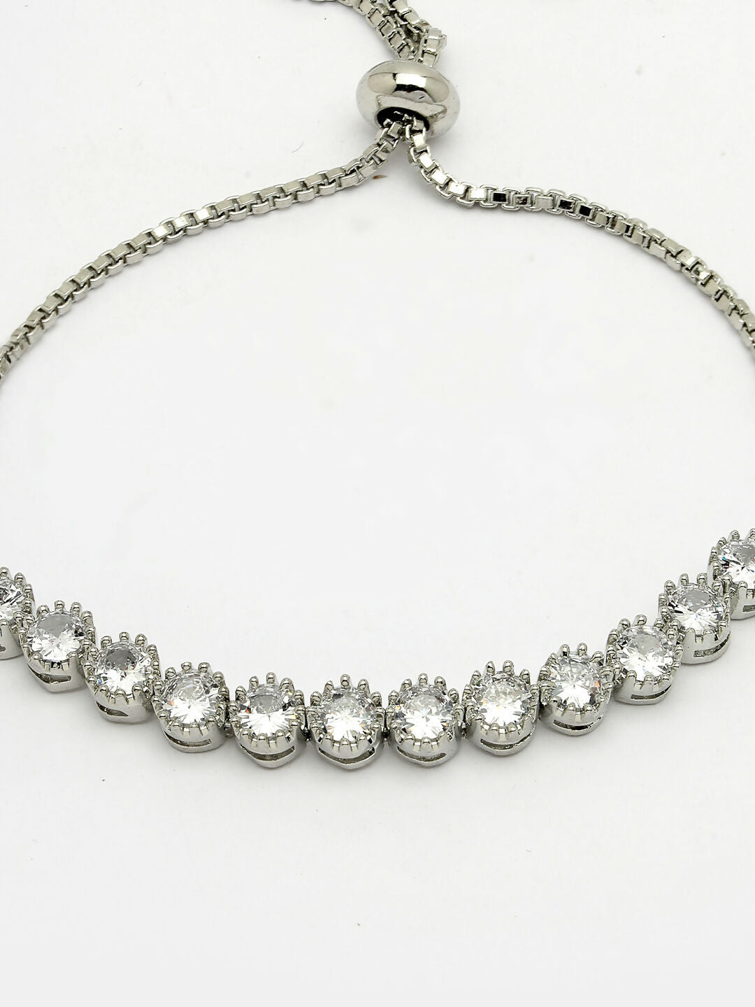 NVR Women Silver-Plated American Diamond Studded Rakhi With Roli Chawal | Swadesiicart