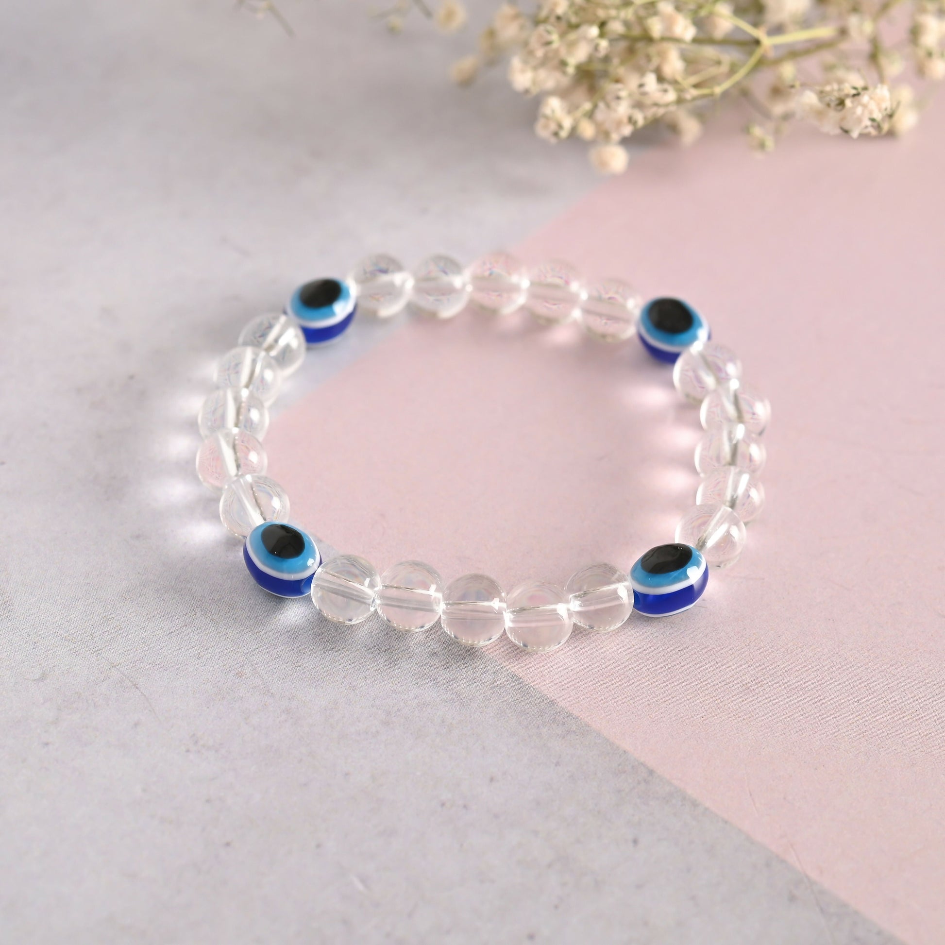 NVR Men & Women Evil Eyetransparent Beaded Elasticated Bracelet - Swadesiicart