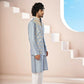 A Powder Blue Floral Hand Embroidered Nehru Jacket by Hilo Design