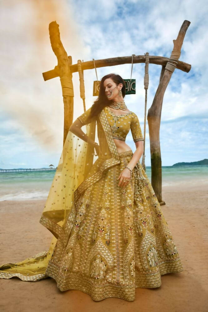House of Panchhi Mustard Bridel Net Sequins, Moti, Mirror And Thread Embroidery Lehenga Choli & Dupatta | Swadesiicart
