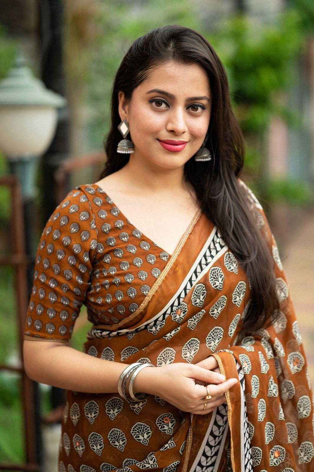 Mustard Poly Georgette Ajrak Saree with Unstitched Blouse - Hiral Fashion | Swadesiicart