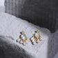 Gold-Toned White Kundan Contemporary Gold-Polished Drop Earrings - Ruby Raang - Swadesiicart