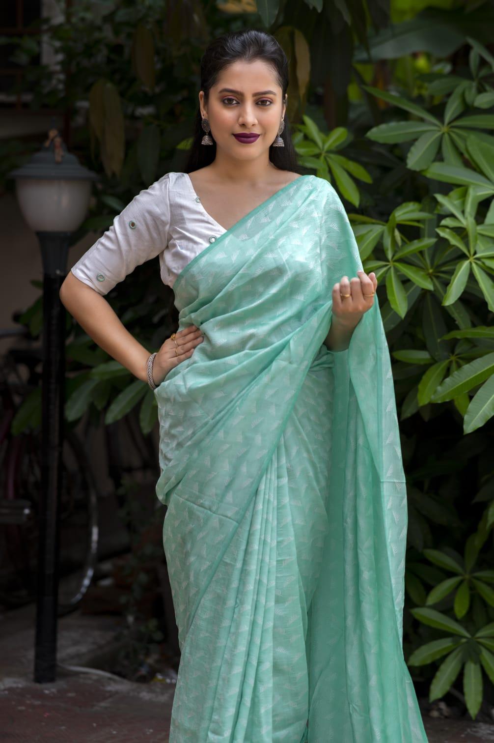 Green Poly Georgette Woven Design Saree with Unstitched Blouse - Hiral Fashion | Swadesiicart