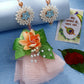 NVR Women & Men Set of 2 Peach Floral Design Pearl Beaded Bhaiya Bhabi Rakhi With Roli Chawal & Chocolate | Swadesiicart