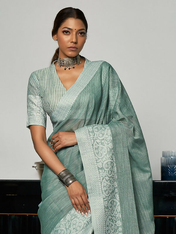 Shree Shyam Fashion Elegant Sea Green Woven Linen Saree with Contrast Zari Border & Tassels - Soft & Breathable Party Wear