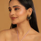 Nuyug 22K Gold Plated Dark Crystal Studded Contemporary Floral Shaped Stud Earrings | Swadesiicart