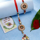 NVR Women & Men Set of 2 Gold-Toned Stone-Studded & Beaded Bhaiya Bhabi Rakhi With Roli Chawal & Chocolate | Swadesiicart