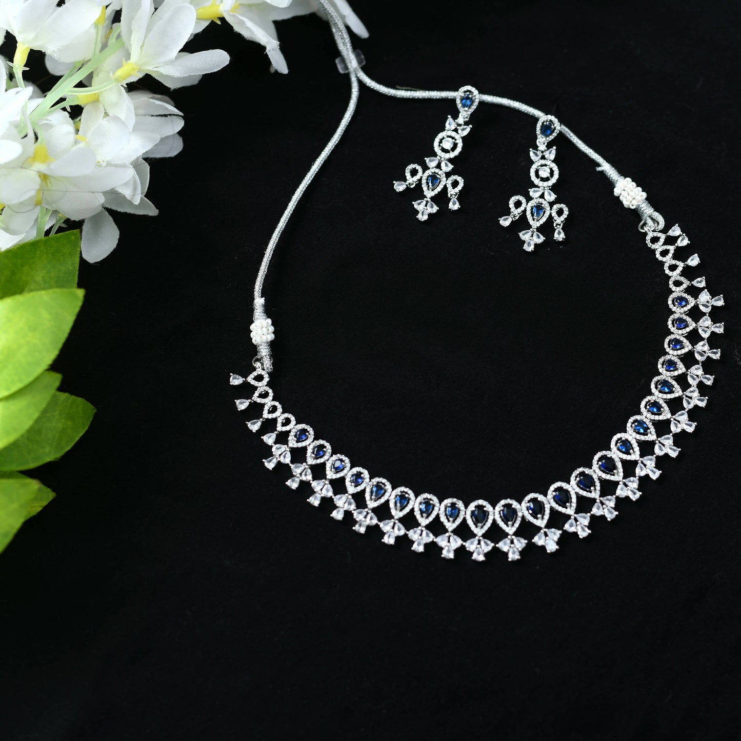 Mominos Fashion Johar Kamal Silver-Plated American Diamond Silver Blue Choker Set | Swadesiicart