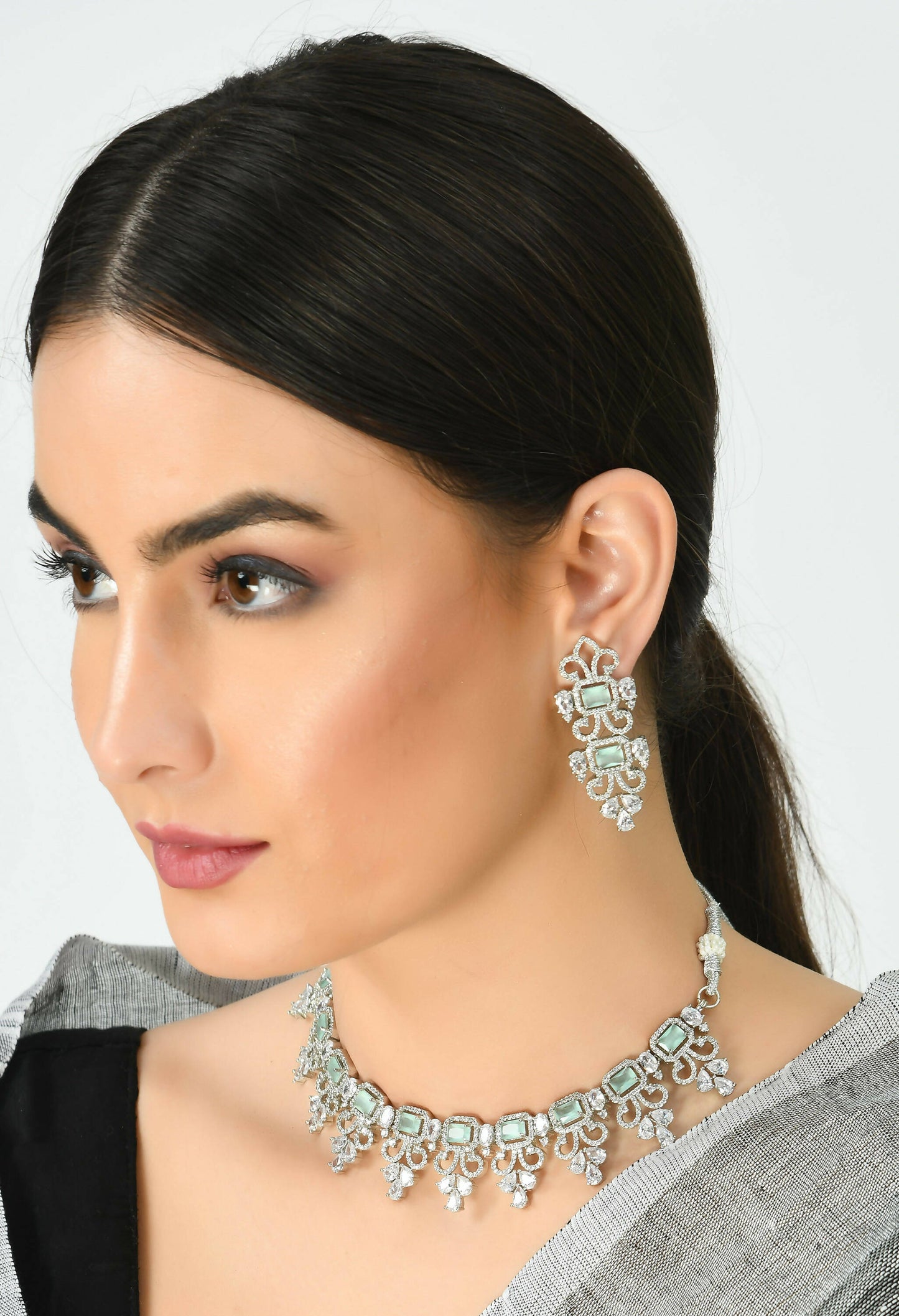 Mominos Fashion Johar Kamal Silver-Plated American Diamond Pista Green Choker Set | Swadesiicart